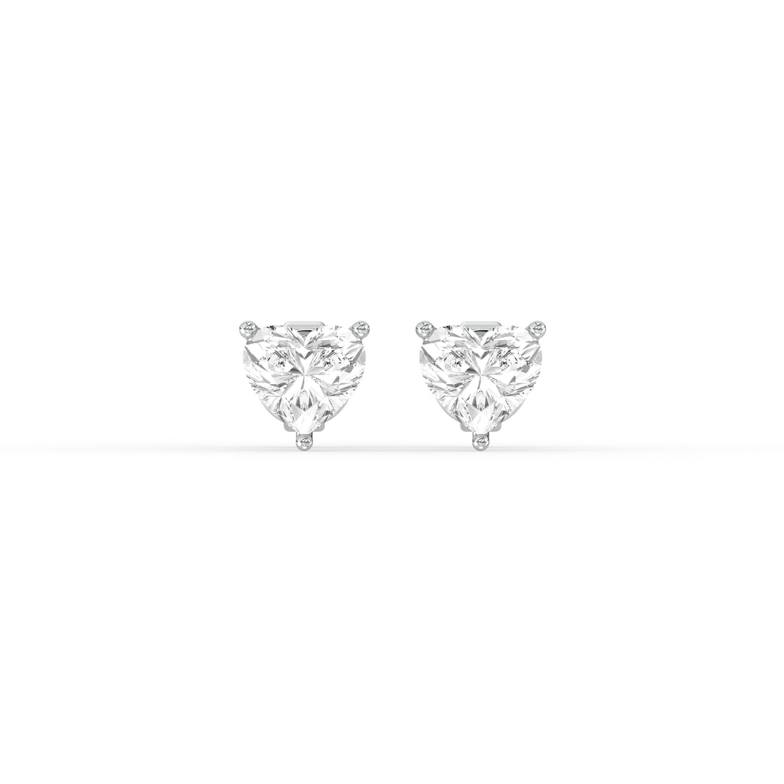 HEART DIAMOND PLATINUM EAR STUDS - ( 1CT) with exquisite heart-shaped diamonds in classic prong setting.