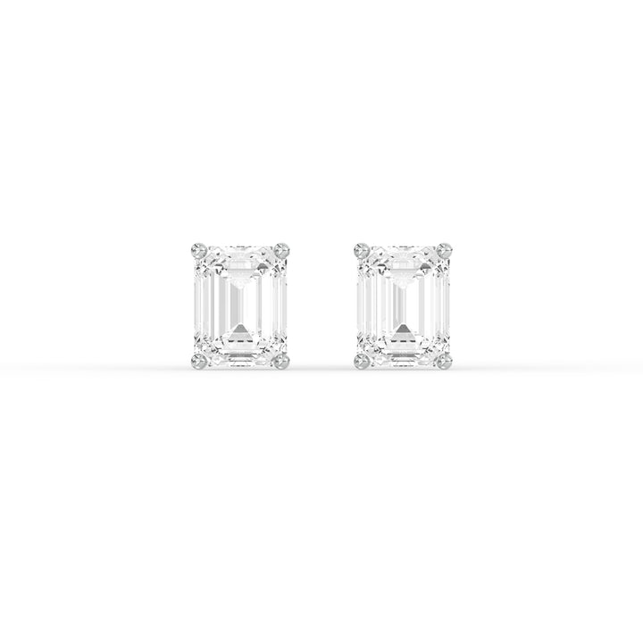 EMERALD DIAMOND PLATINUM EAR STUDS - ( 2.06CT) featuring sparkling emerald-cut diamonds in platinum setting.