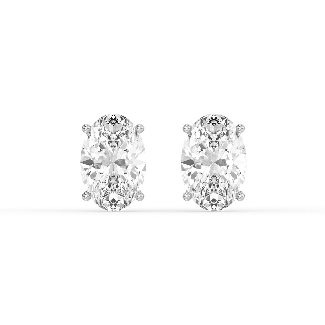 OVAL DIAMOND PLATINUM EAR STUDS - ( 2.06CT) showcasing elegant oval-cut diamonds in a prong setting.