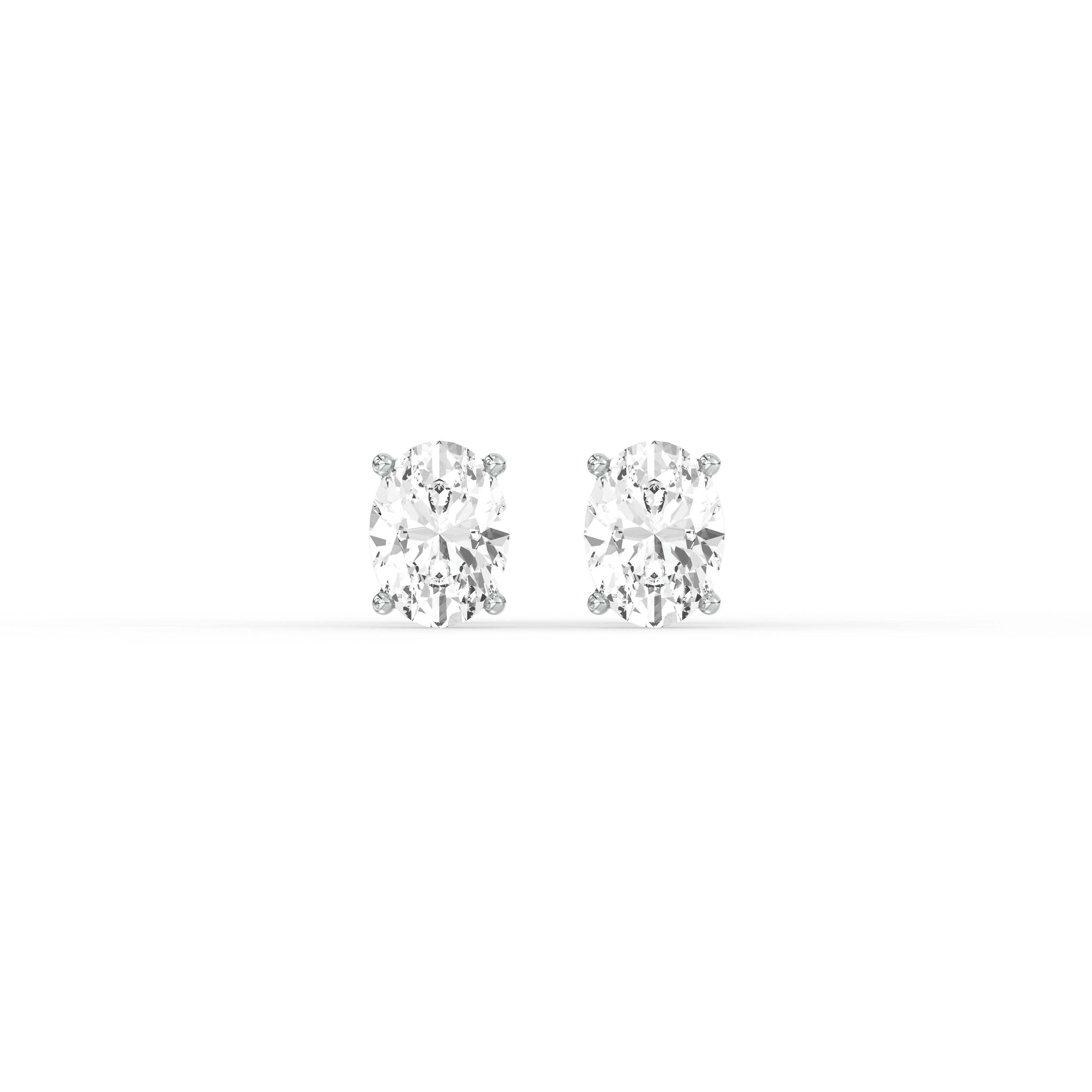 OVAL DIAMOND PLATINUM EAR STUDS - ( 1CT) featuring oval-cut diamonds in a classic prong setting.