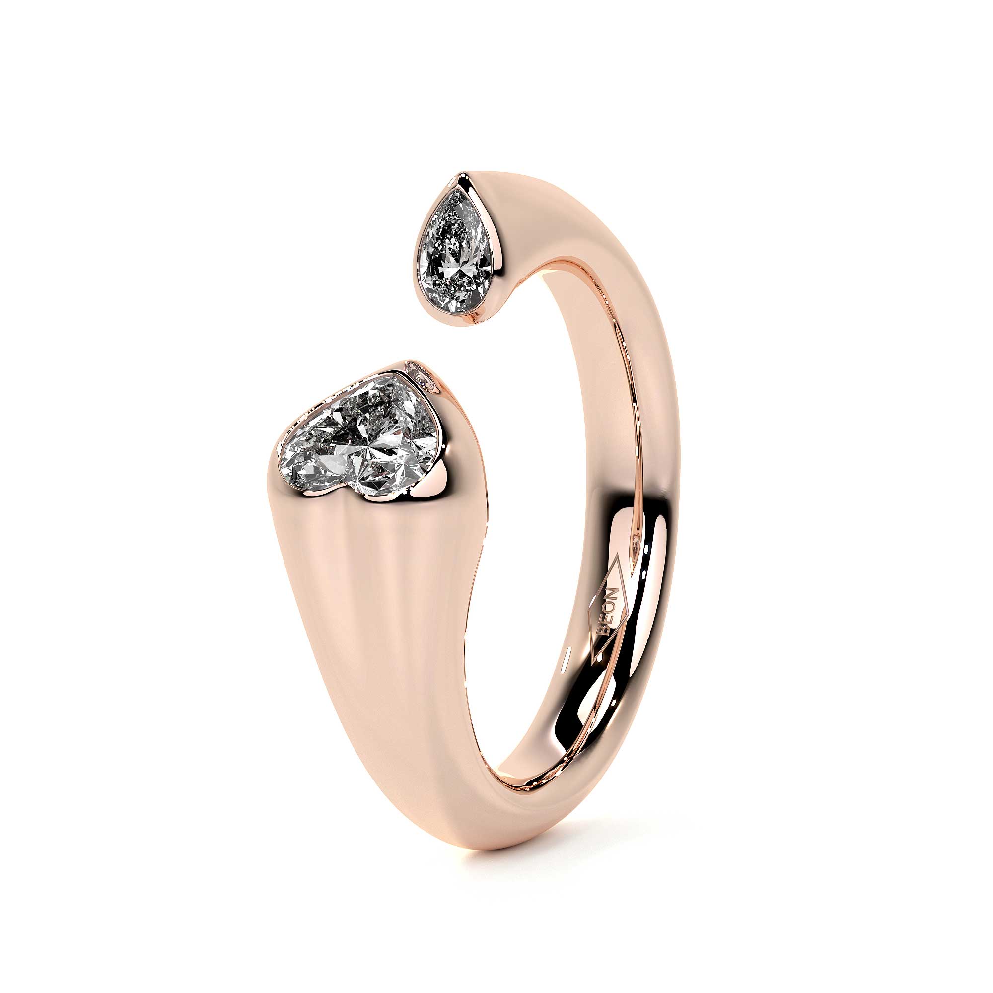 Sculpted Unity Ring in rose gold featuring heart and pear-shaped diamonds on a fluid band.