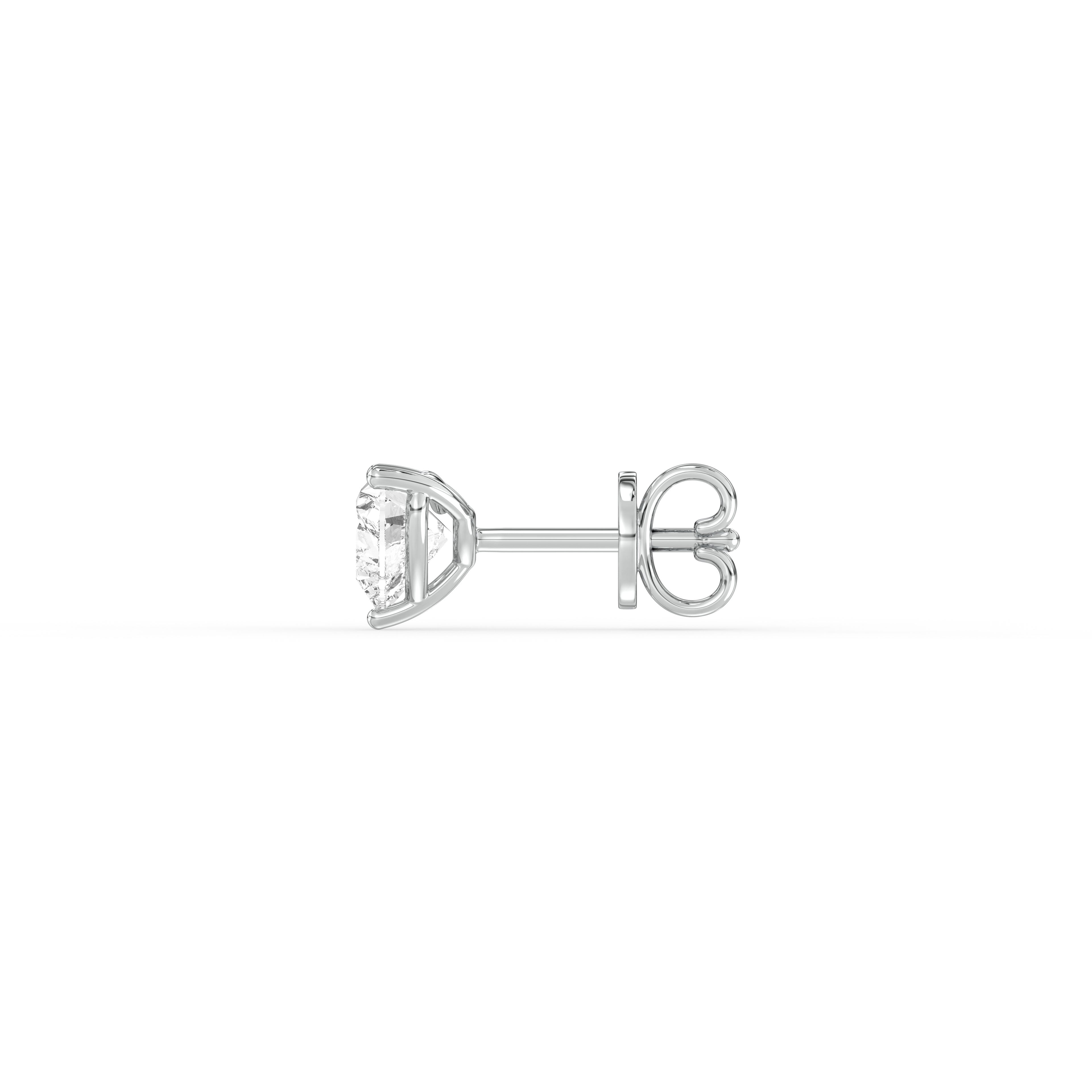 HEART DIAMOND PLATINUM EAR STUDS - ( 0.8CT) showcasing a delicate heart-shaped diamond in a platinum setting.