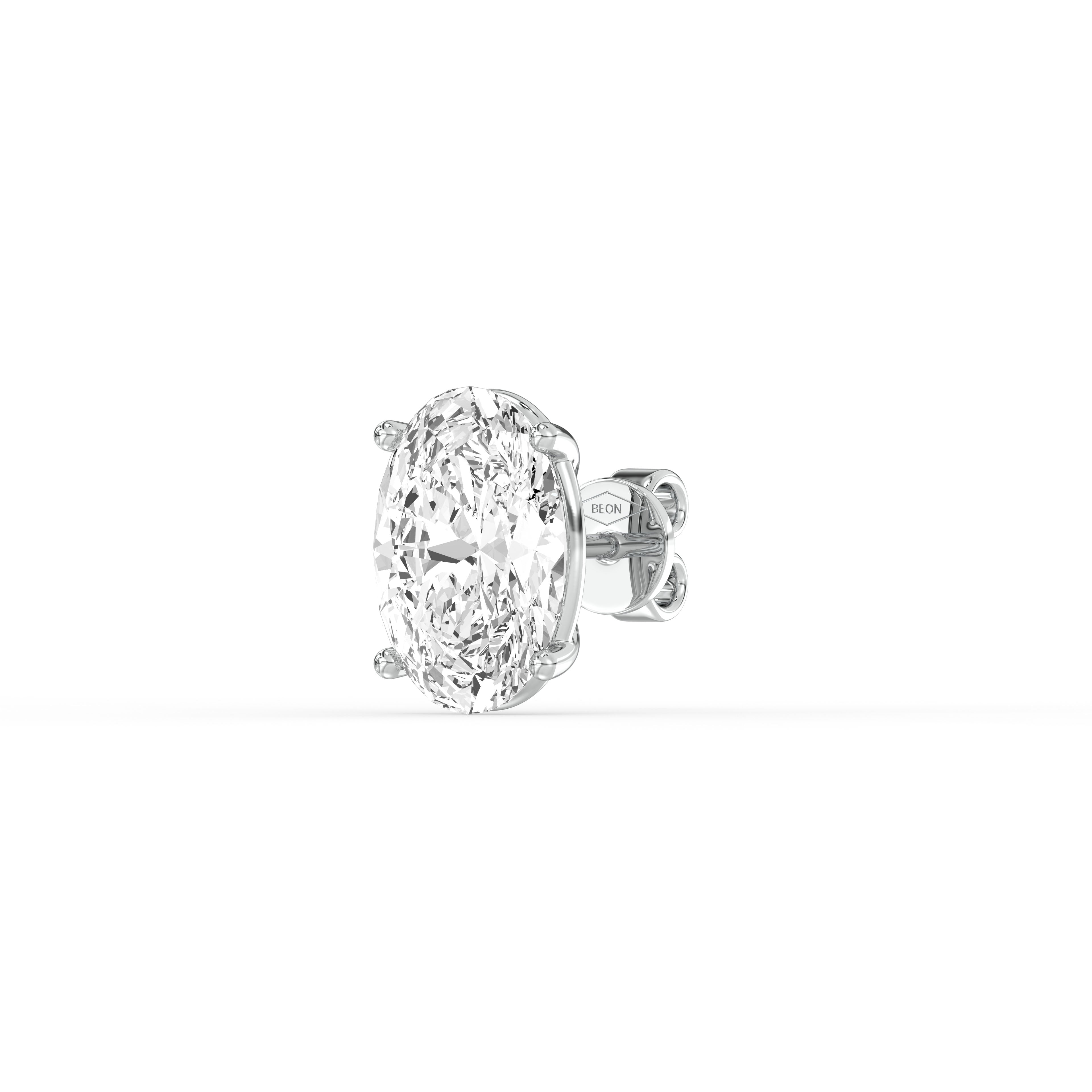 OVAL DIAMOND PLATINUM EAR STUDS - ( 2.06CT) showcasing a brilliant oval-cut diamond in a classic prong setting.