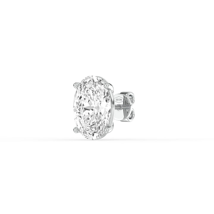 OVAL DIAMOND PLATINUM EAR STUDS - ( 2.06CT) showcasing a brilliant oval-cut diamond in a classic prong setting.