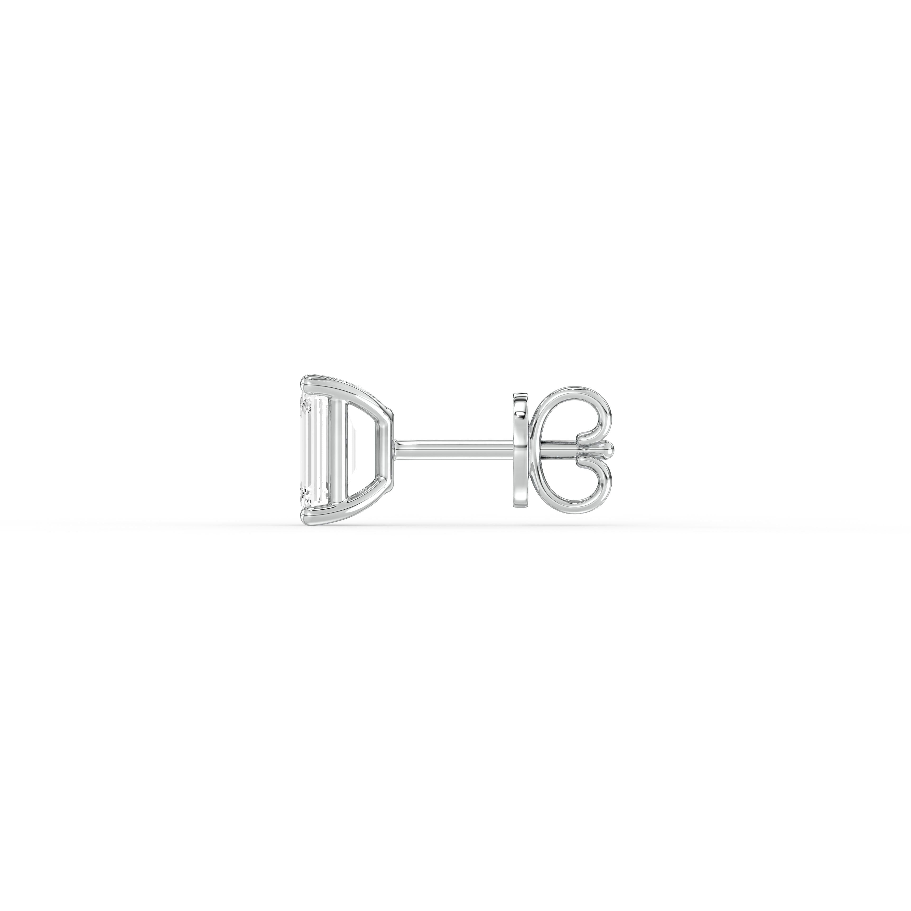 EMERALD DIAMOND PLATINUM EAR STUDS - ( 0.86CT) showcasing refined prong setting and architectural beauty.