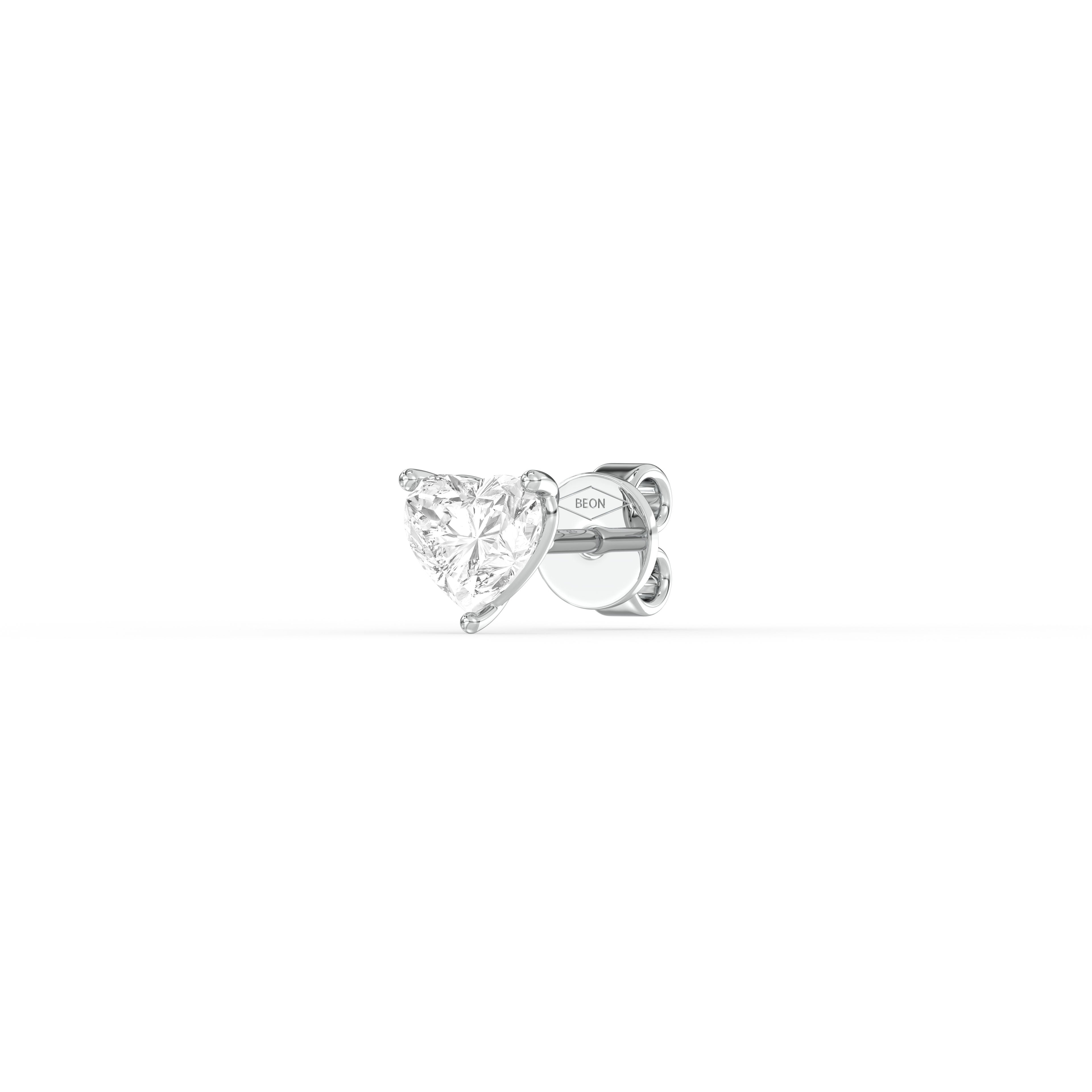 HEART DIAMOND PLATINUM EAR STUDS - ( 0.8CT) showcasing a heart-shaped diamond in a sleek platinum setting.