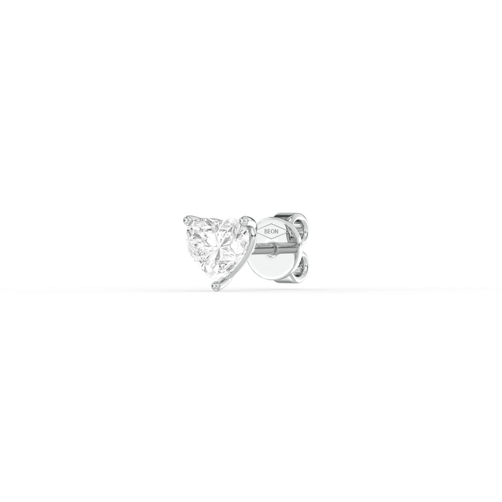 HEART DIAMOND PLATINUM EAR STUDS - ( 0.8CT) showcasing a heart-shaped diamond in a sleek platinum setting.
