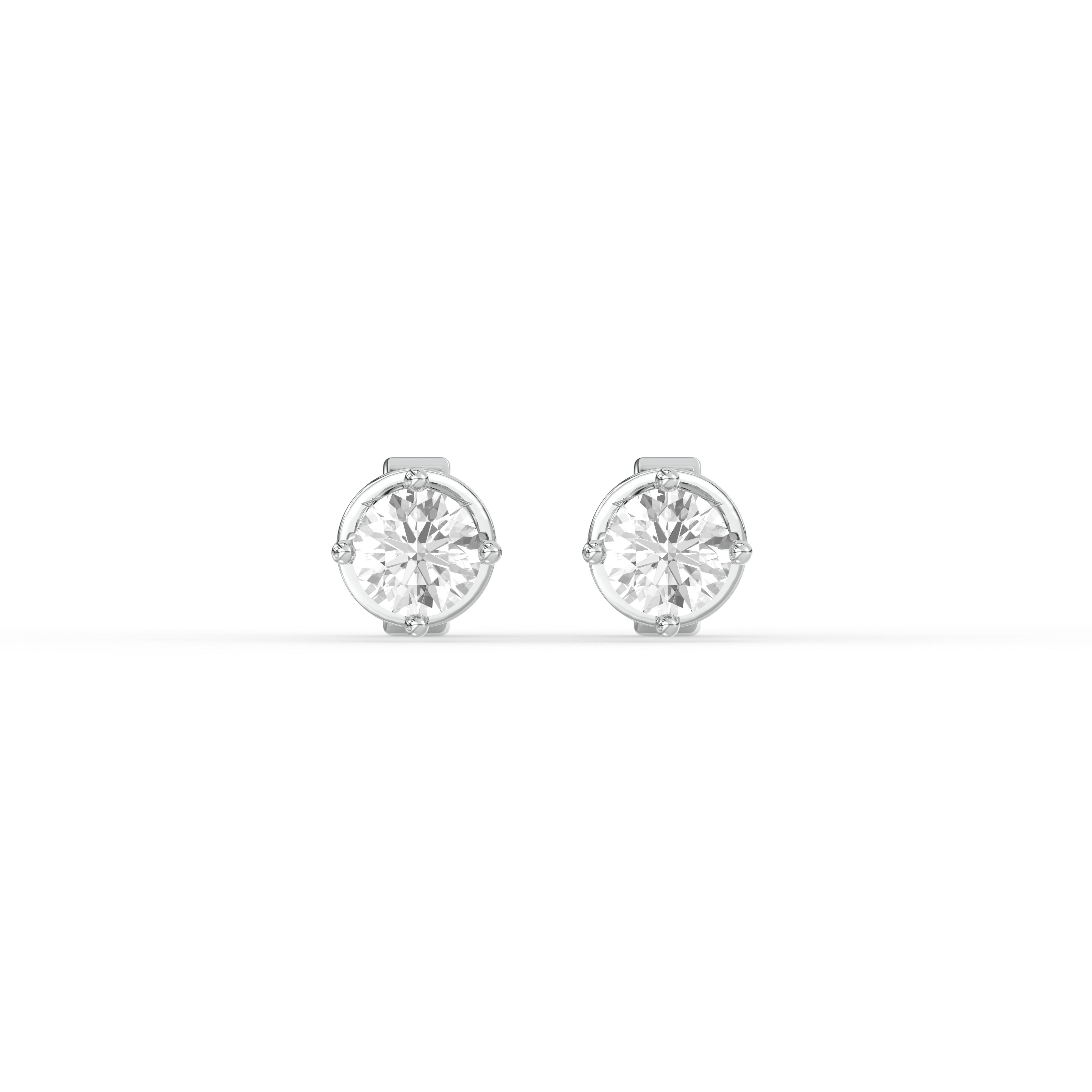 ROUND DIAMOND PLATINUM EAR STUDS - ( 1.02CT) featuring round brilliant diamonds in a classic prong setting.