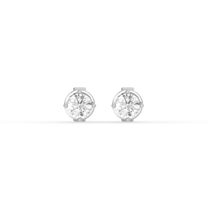 ROUND DIAMOND PLATINUM EAR STUDS - ( 1.02CT) featuring round brilliant diamonds in a classic prong setting.