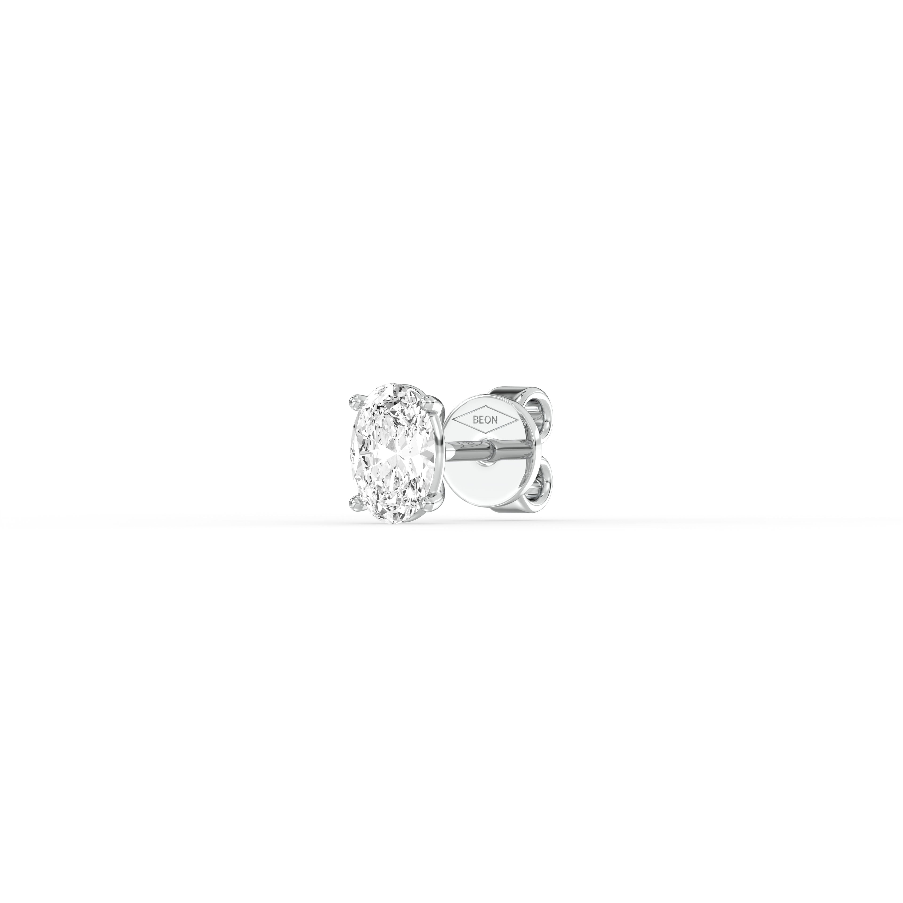 OVAL DIAMOND PLATINUM EAR STUDS - ( 0.72CT) showcased in a sleek platinum setting, highlighting its elegant oval-cut design.