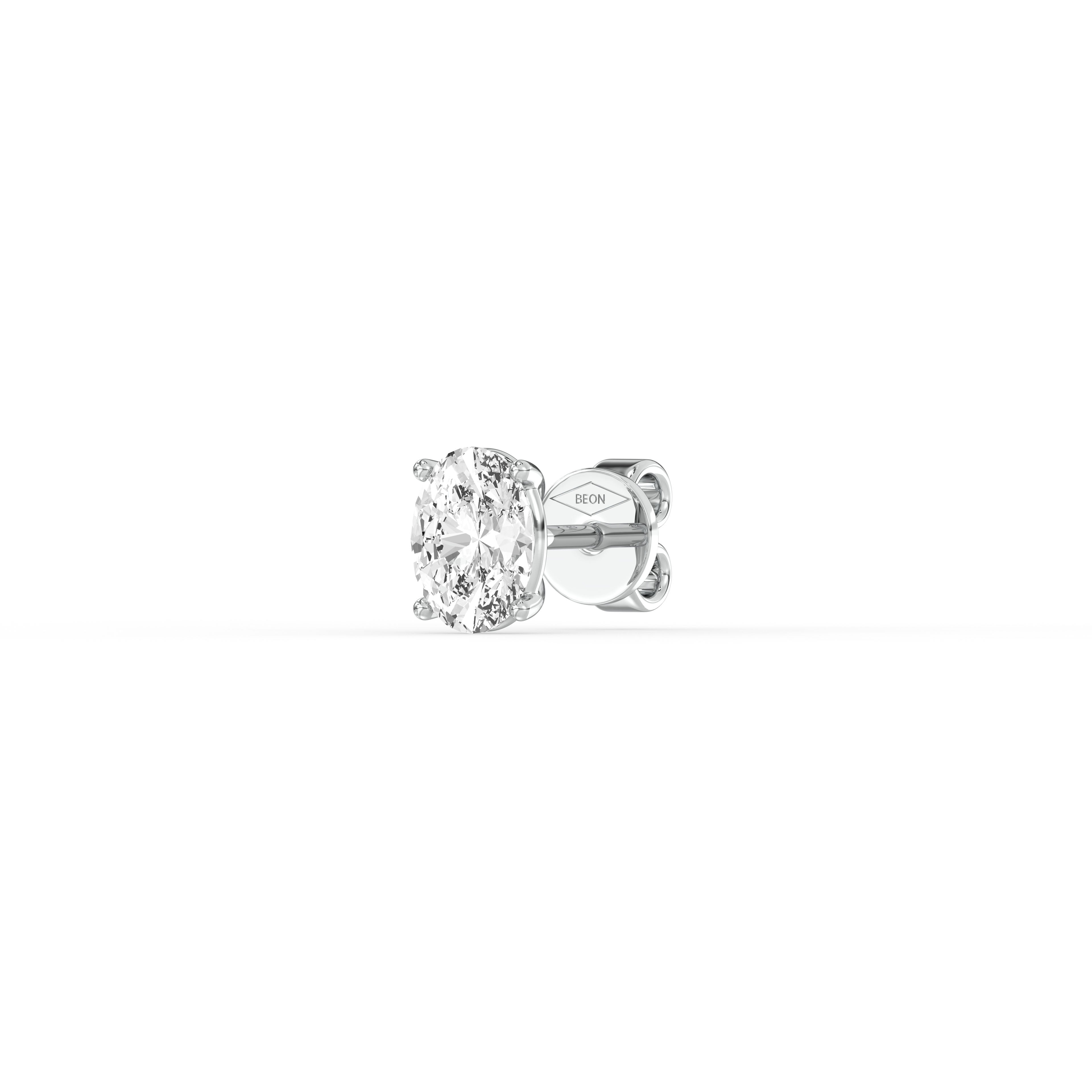 OVAL DIAMOND PLATINUM EAR STUDS - ( 1CT) featuring an exquisite oval-cut diamond in a classic prong setting.