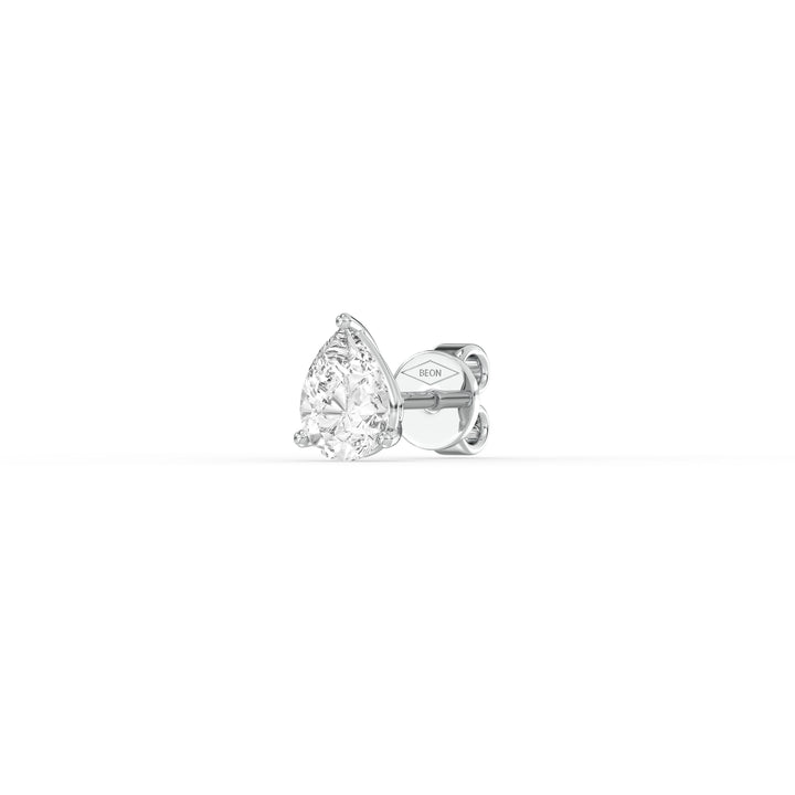 PEAR DIAMOND PLATINUM EAR STUDS - ( 0.92CT) showcasing the elegant pear-shaped diamond in a platinum setting.