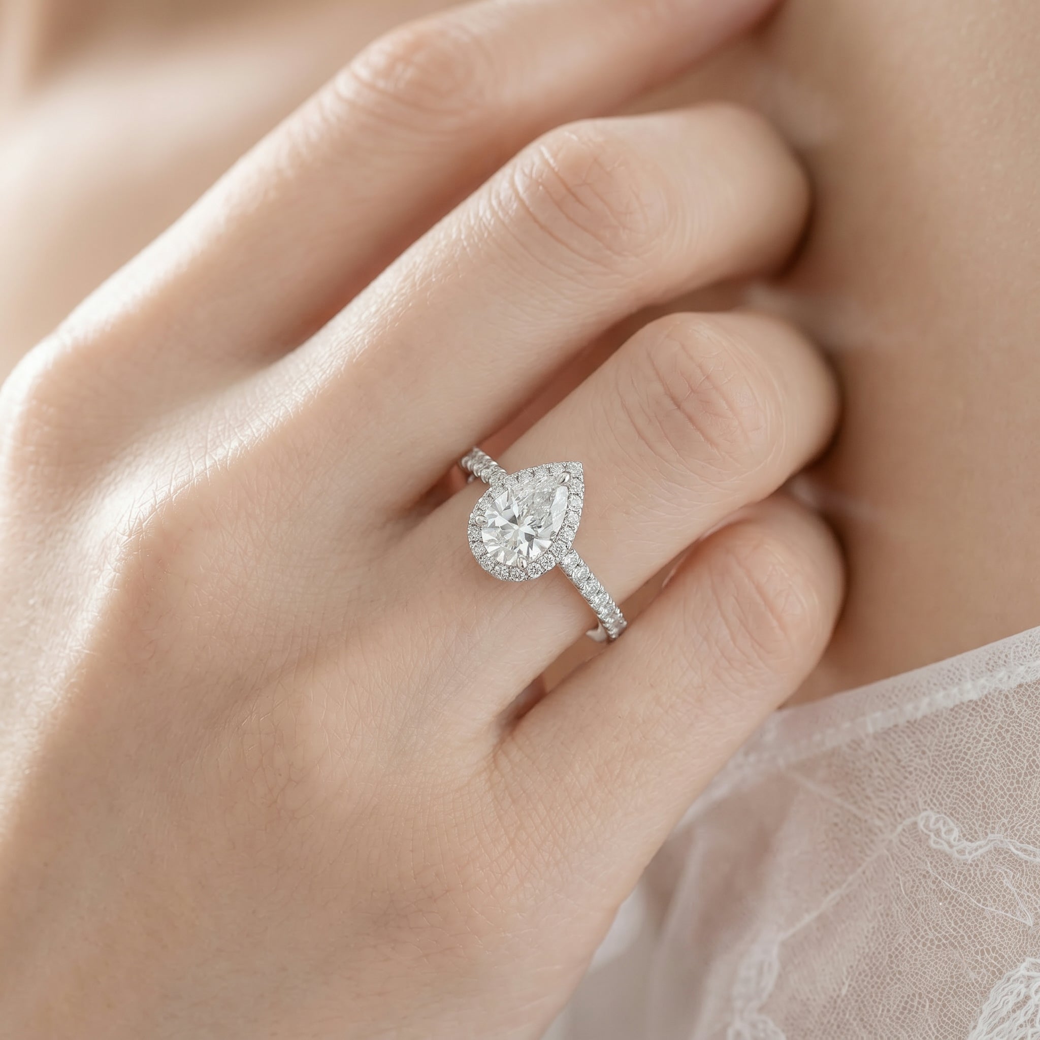 PEAR DIAMOND HALO RING ( 1 CT)