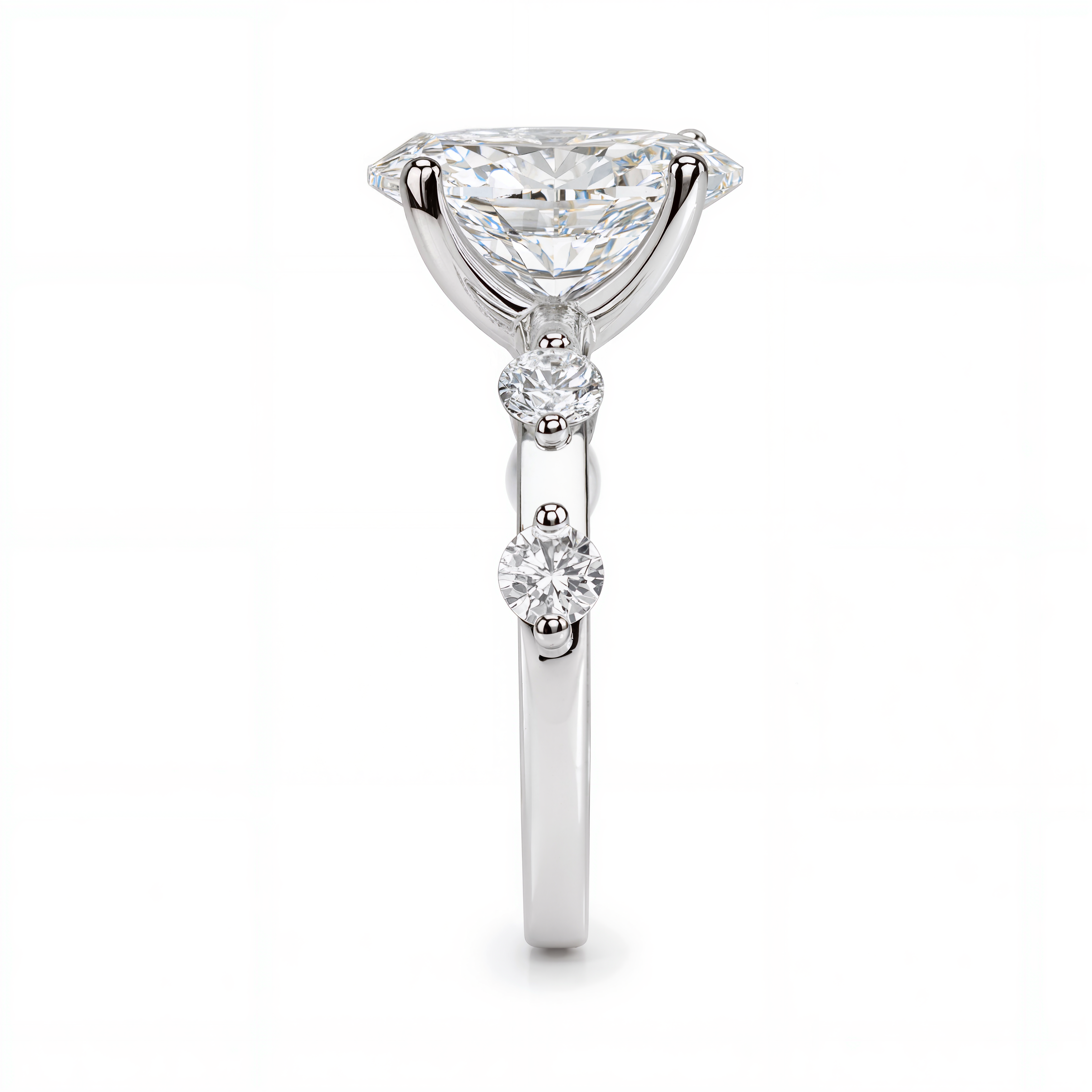OVAL DIAMOND WITH SIDE DIAMONDS RING