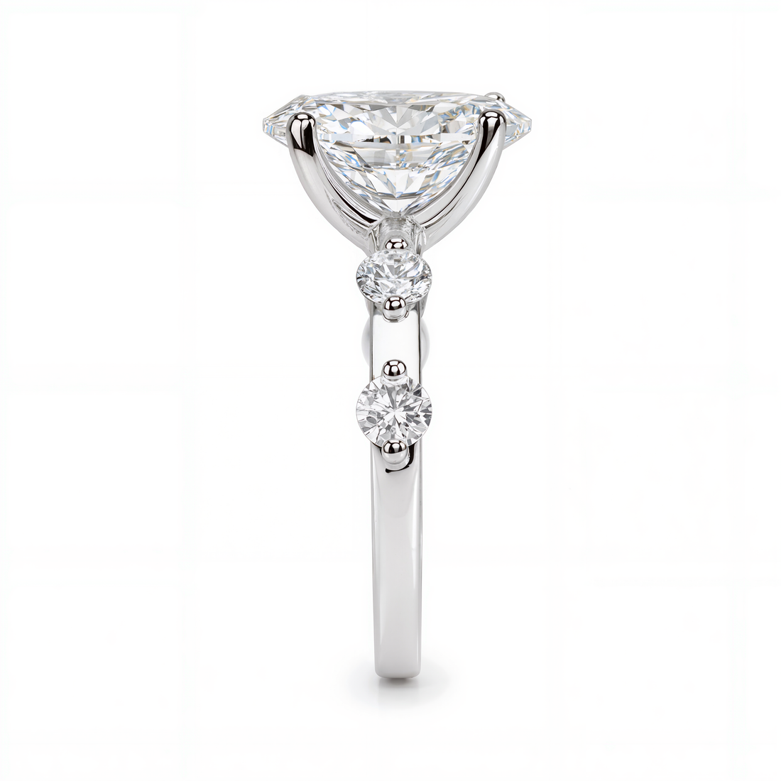 OVAL DIAMOND WITH SIDE DIAMONDS RING