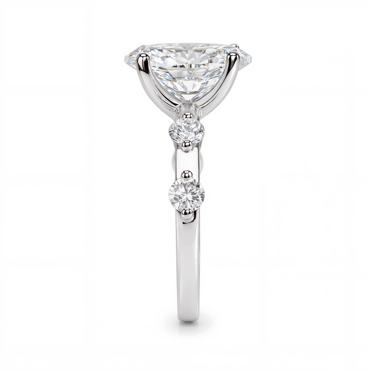 OVAL DIAMOND WITH SIDE DIAMONDS RING