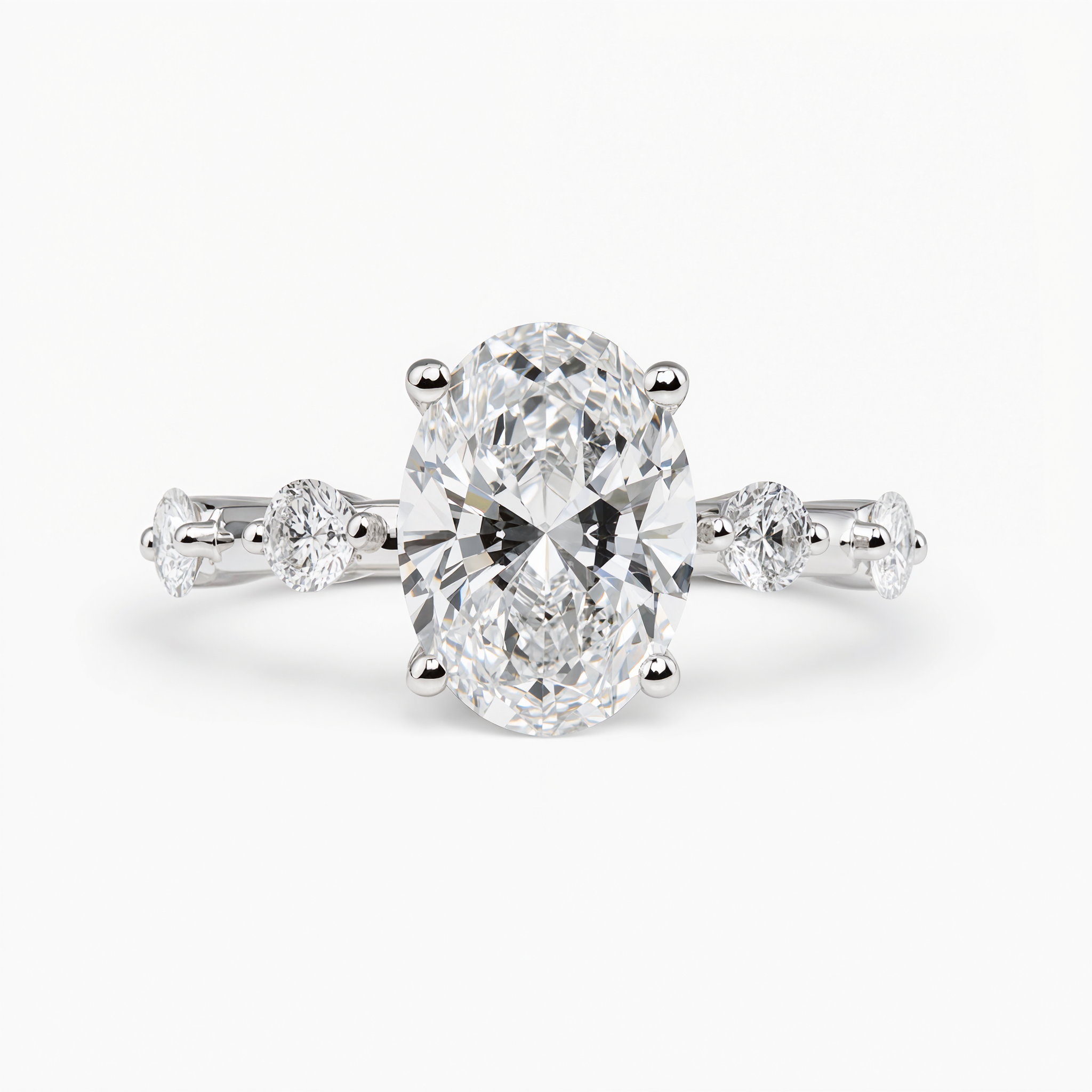 OVAL DIAMOND WITH SIDE DIAMONDS RING