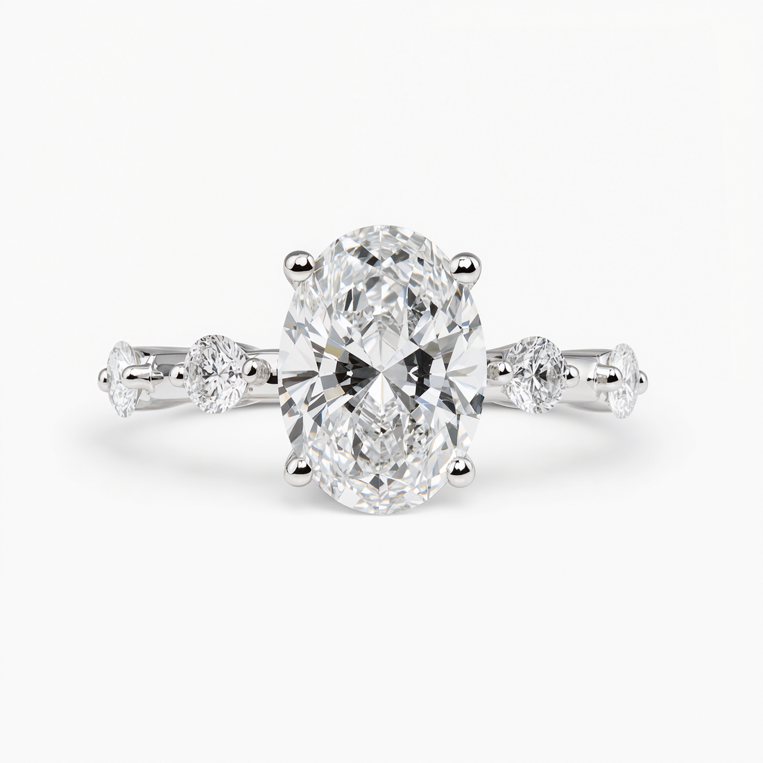 OVAL DIAMOND WITH SIDE DIAMONDS RING