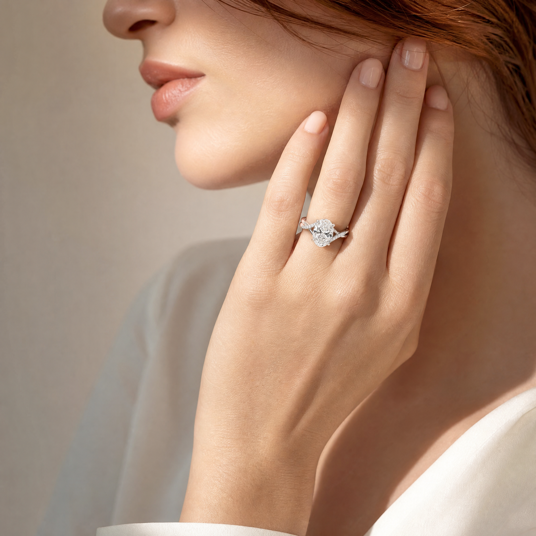 OVAL DIAMOND WITH HIDDEN PAVE TWIST SHANK RING