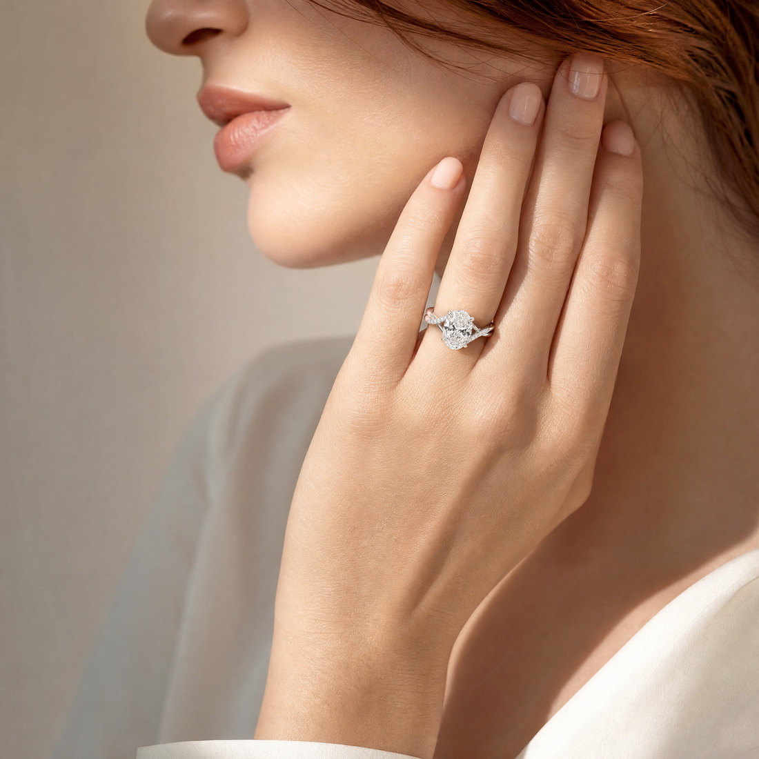 OVAL DIAMOND WITH HIDDEN PAVE TWIST SHANK RING