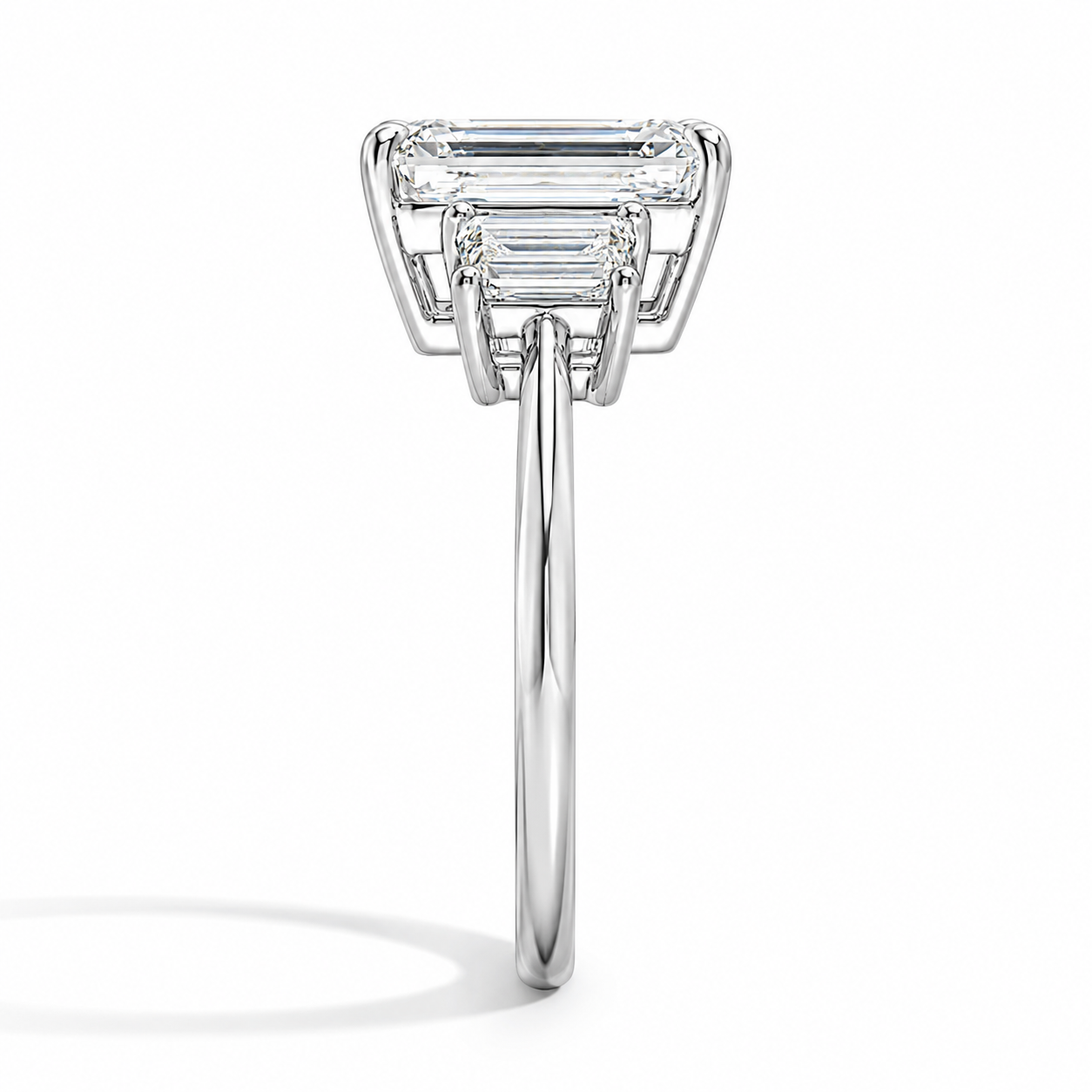 EMERALD CUT DIAMOND TRILOGY RING