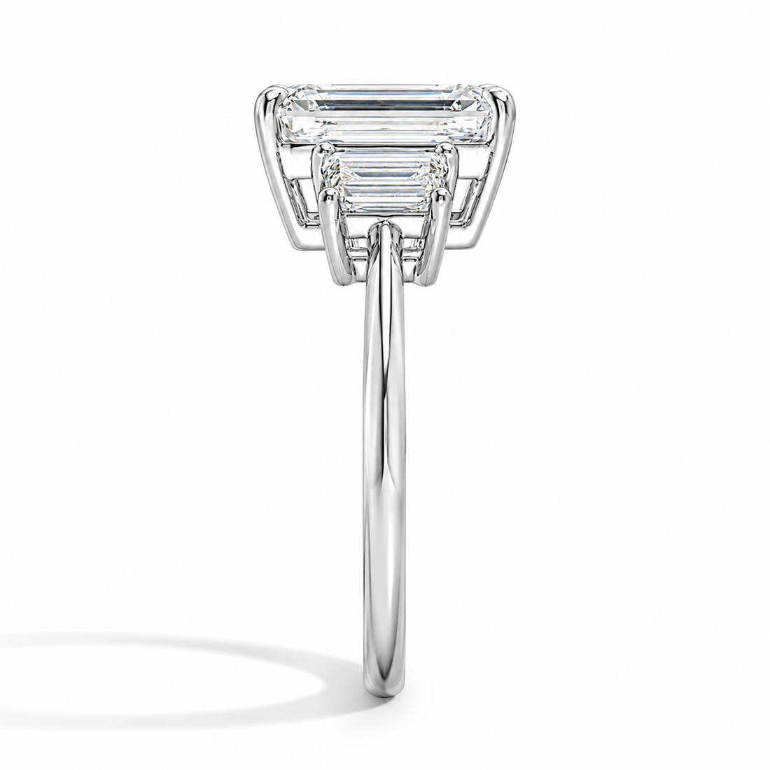 EMERALD CUT DIAMOND TRILOGY RING