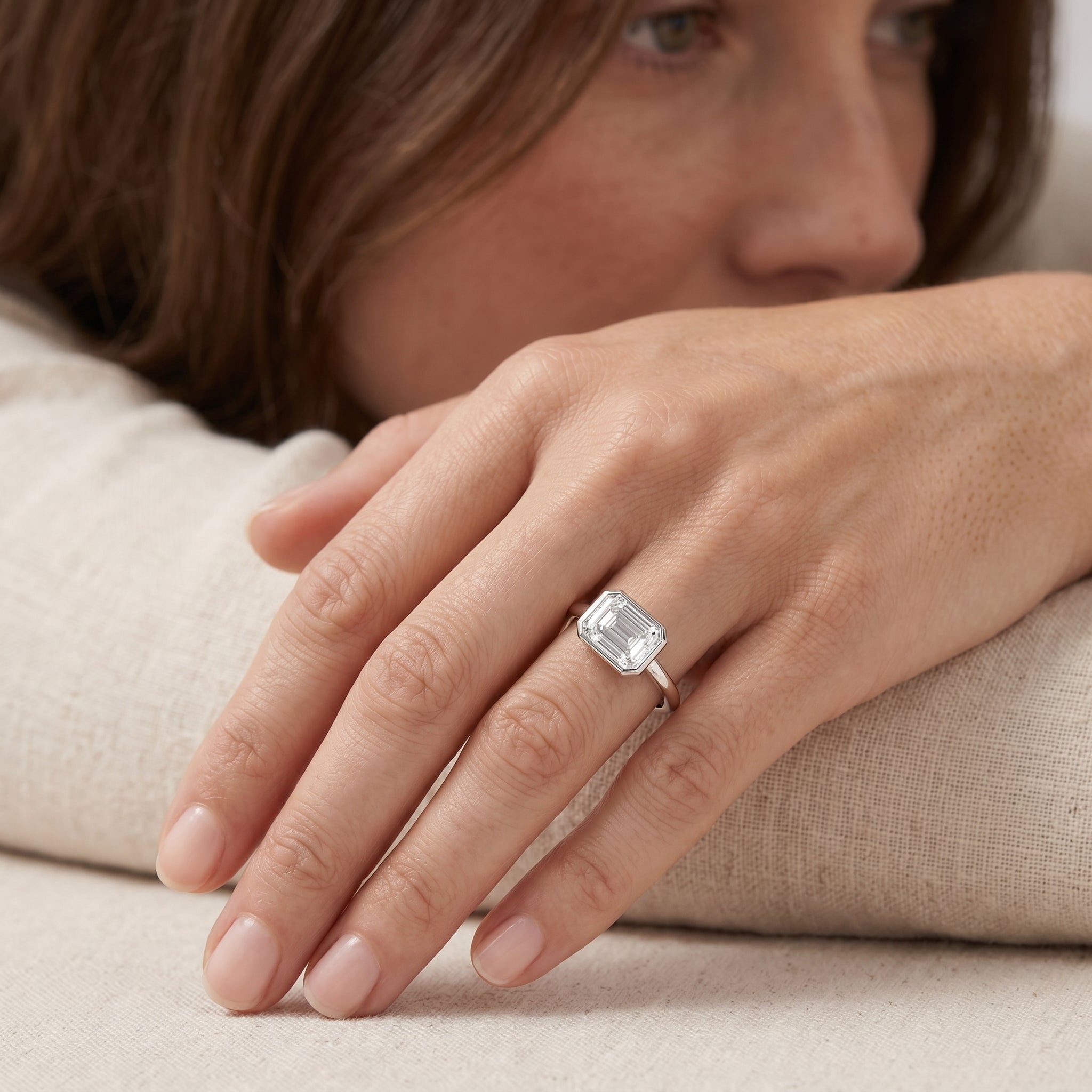 EMERALD CUT DIAMOND EAST WEST SOLITAIRE RING