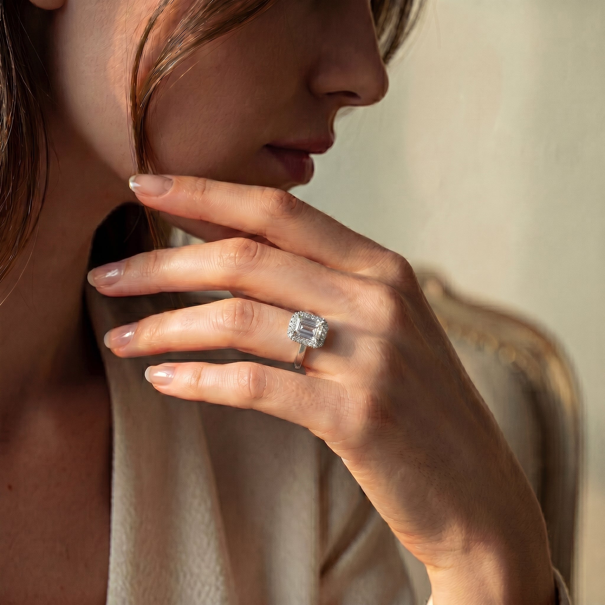 EMERALD CUT DIAMOND HALO RING