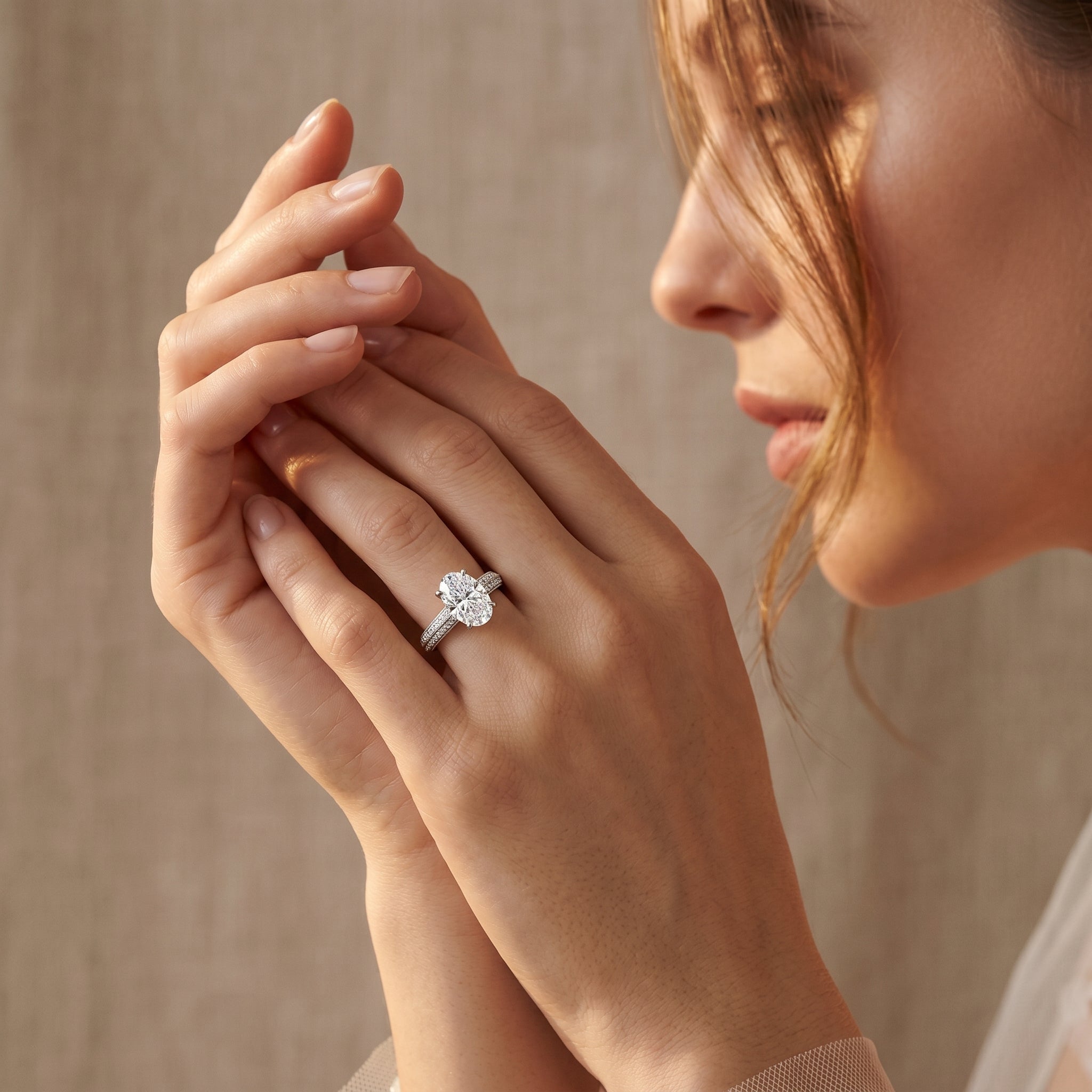 OVAL DIAMOND KNIFE EDGE PAVE RING