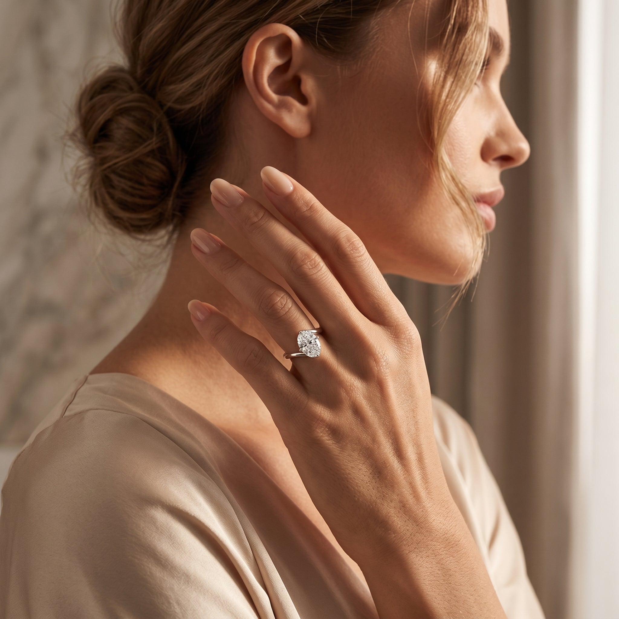 OVAL DIAMOND TWIST SOLITAIRE RING
