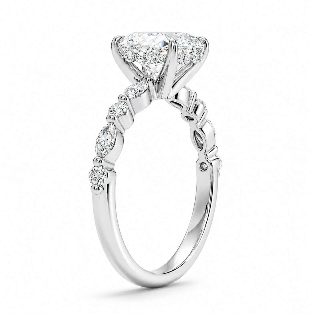 OVAL DIAMOND WITH SIDESTONES DIAMOND PAVE RING