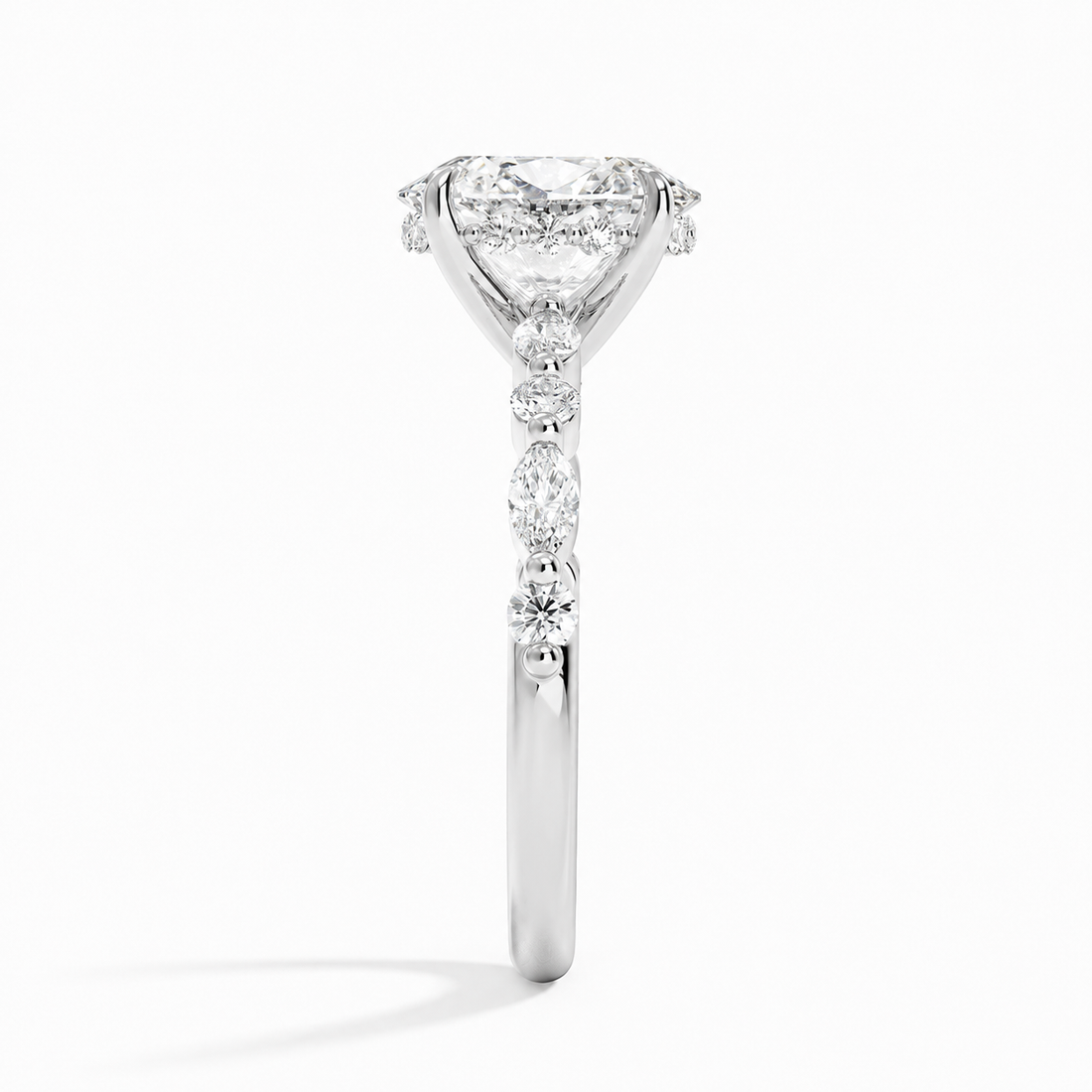 OVAL DIAMOND WITH SIDESTONES DIAMOND PAVE RING